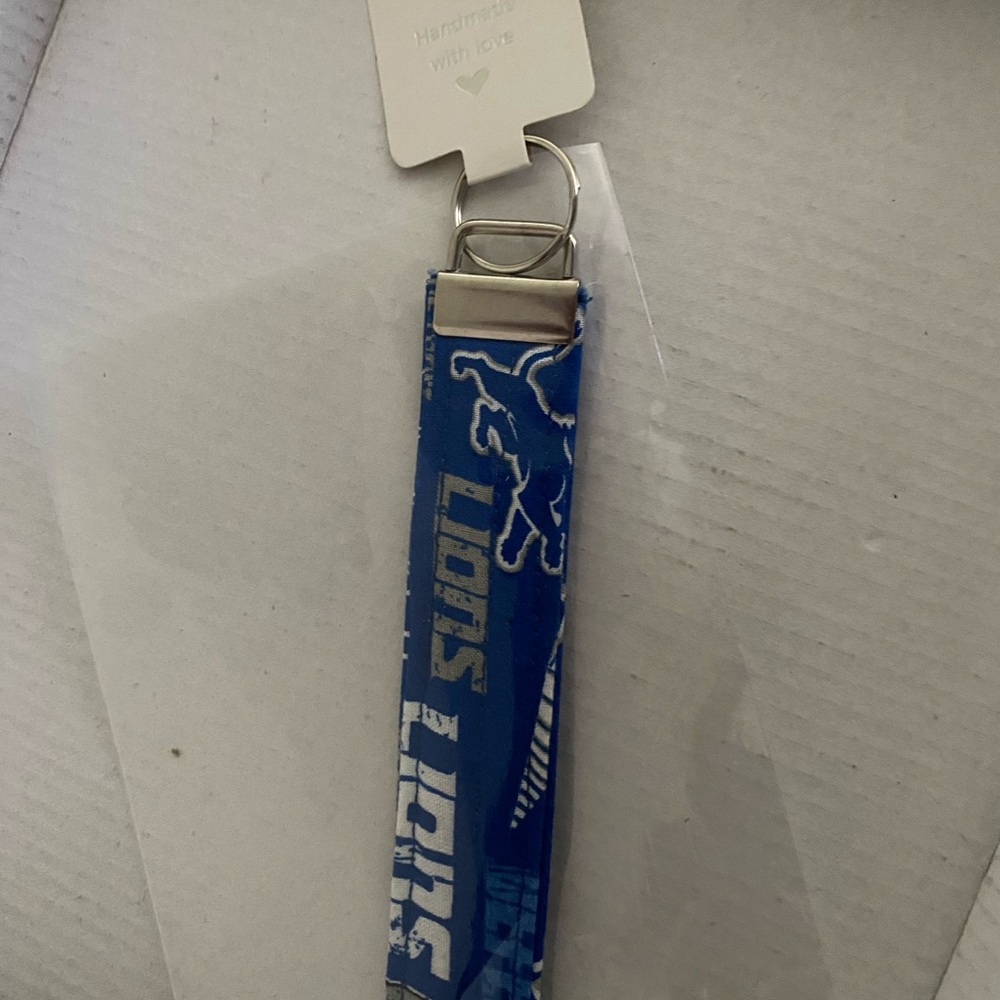 NFL Detroit Lions Blue Keychain with White Graphic Design